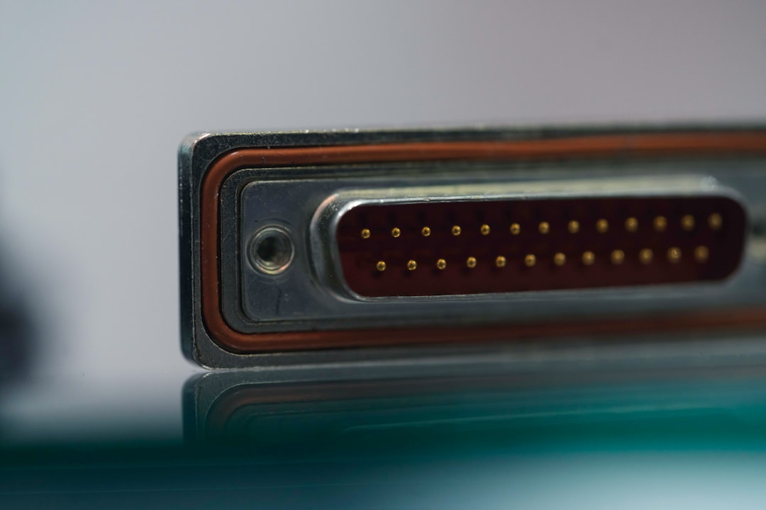 a close up of a metal object with a reflection on the surface