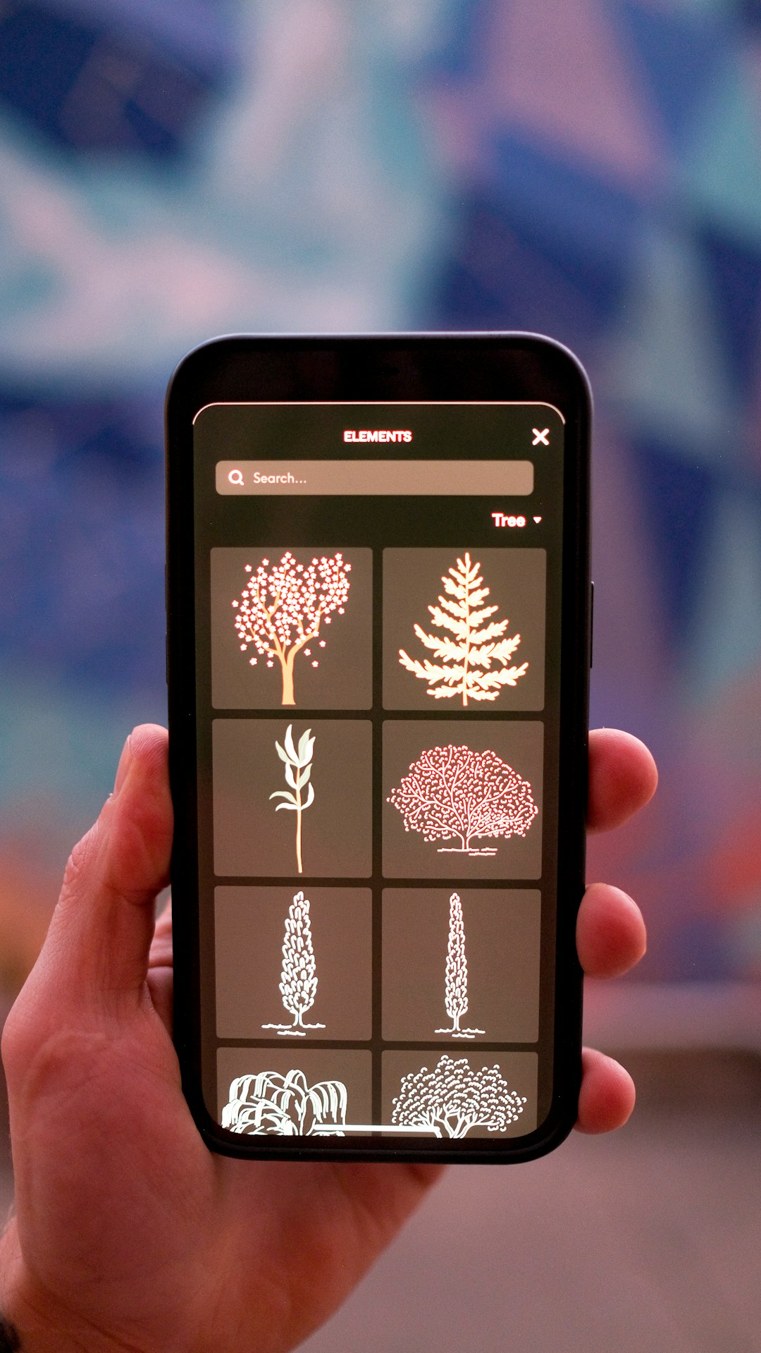 a hand holding a smart phone