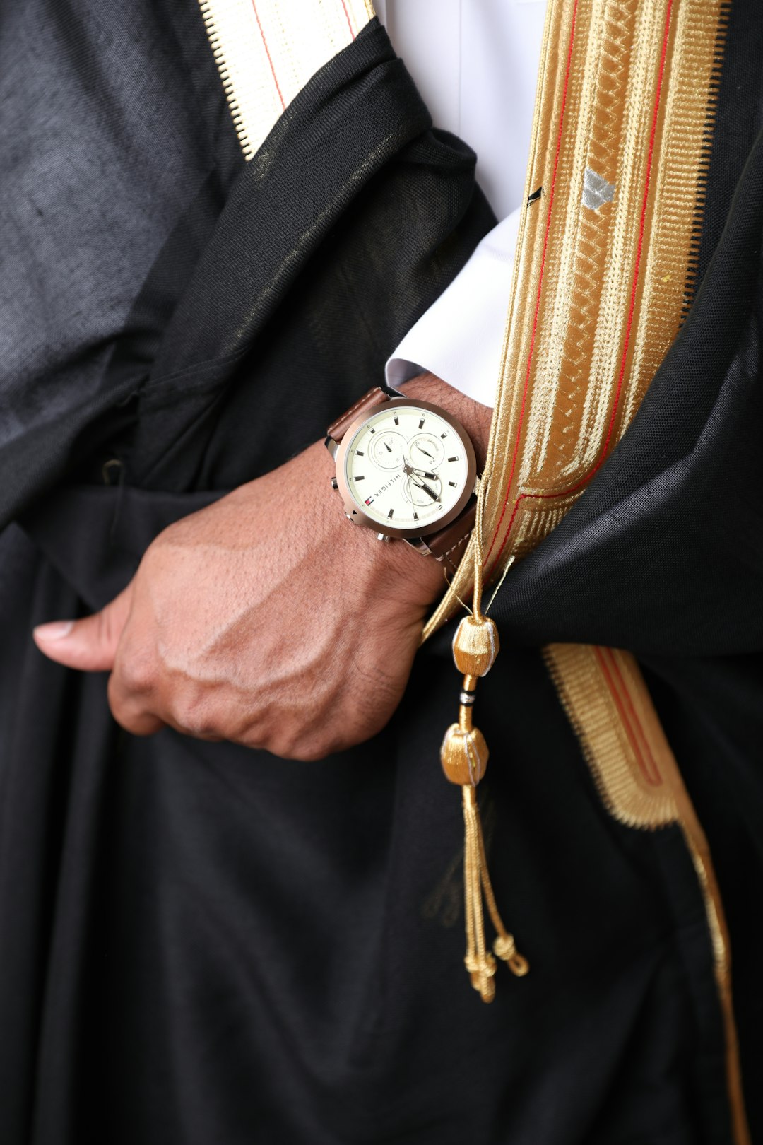 a close up of a person wearing a watch