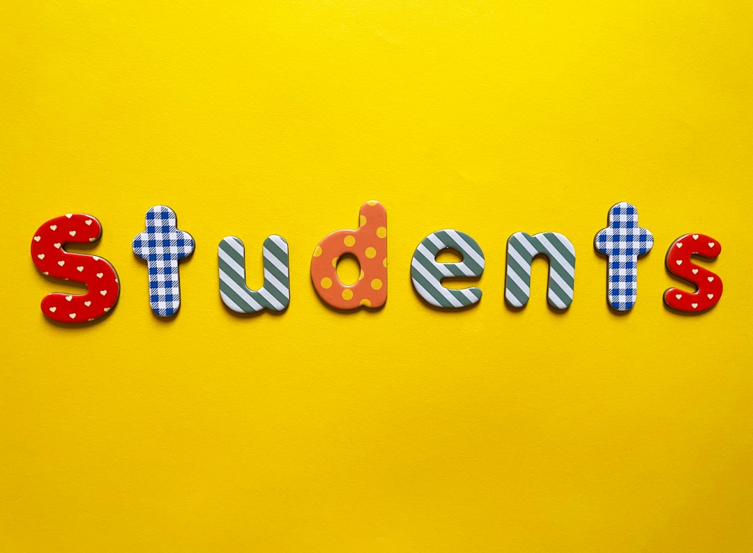 a yellow background with the word students spelled out
