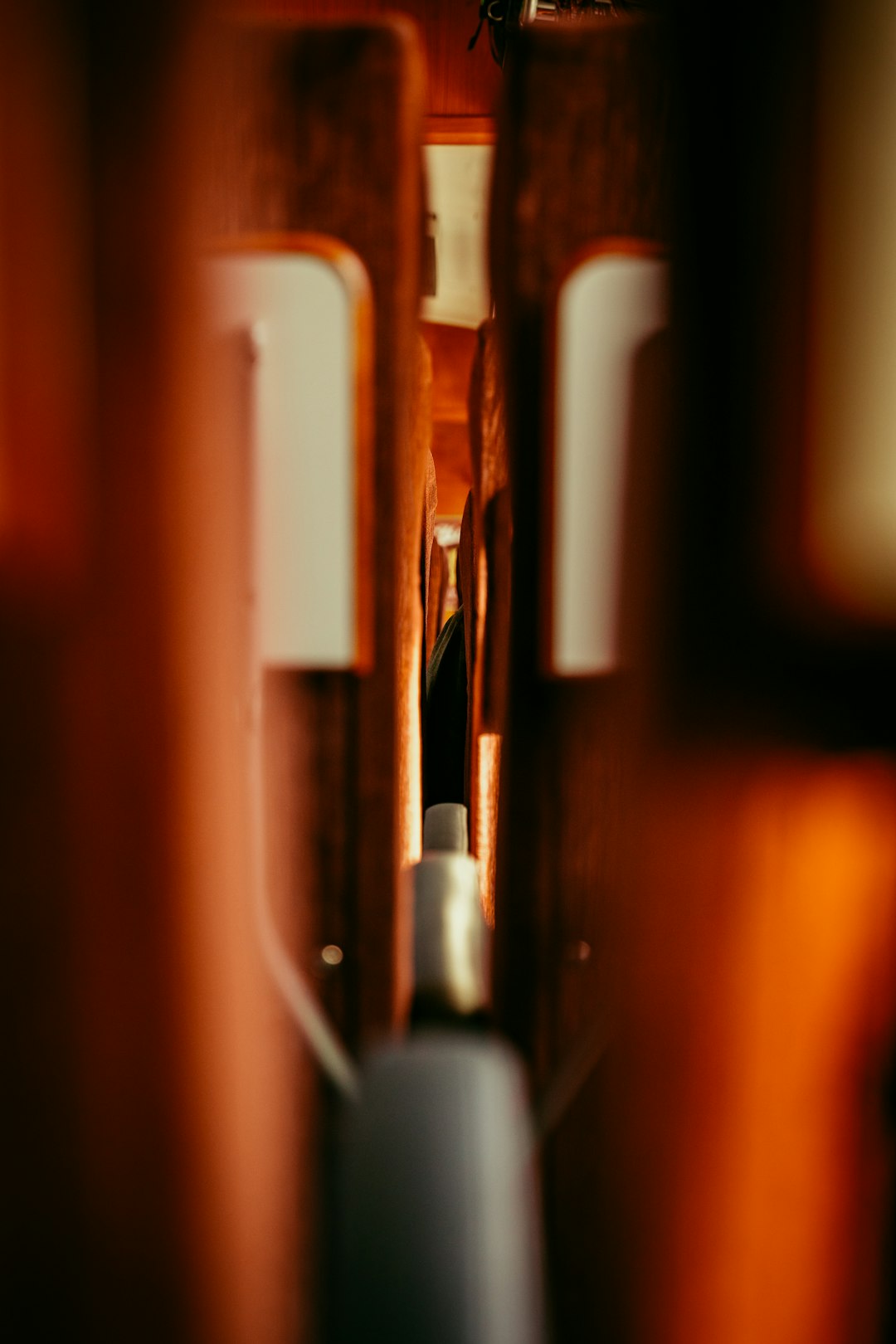 a close up of a door handle on a wooden door