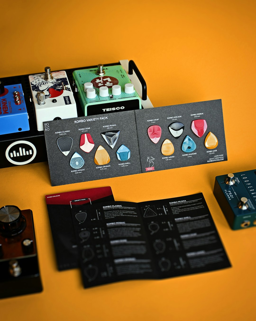 a group of electronics sitting on top of a table