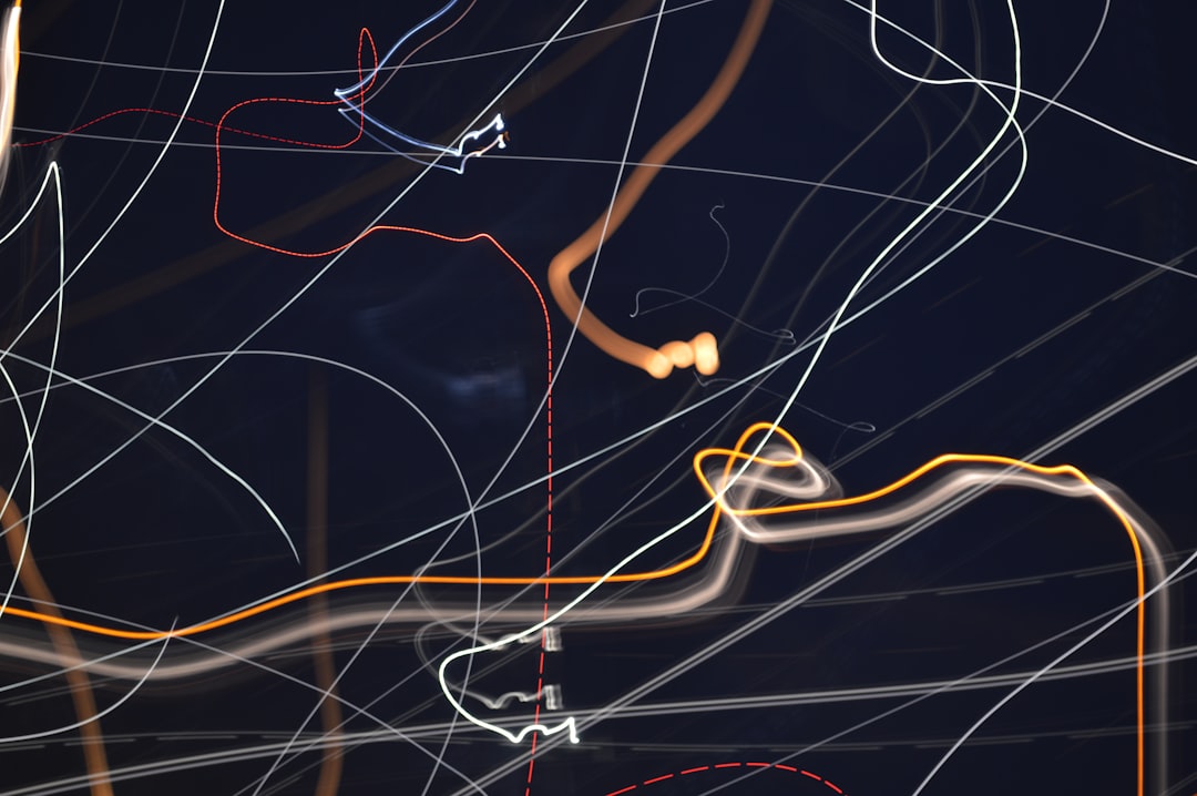 a blurry photo of a street light at night