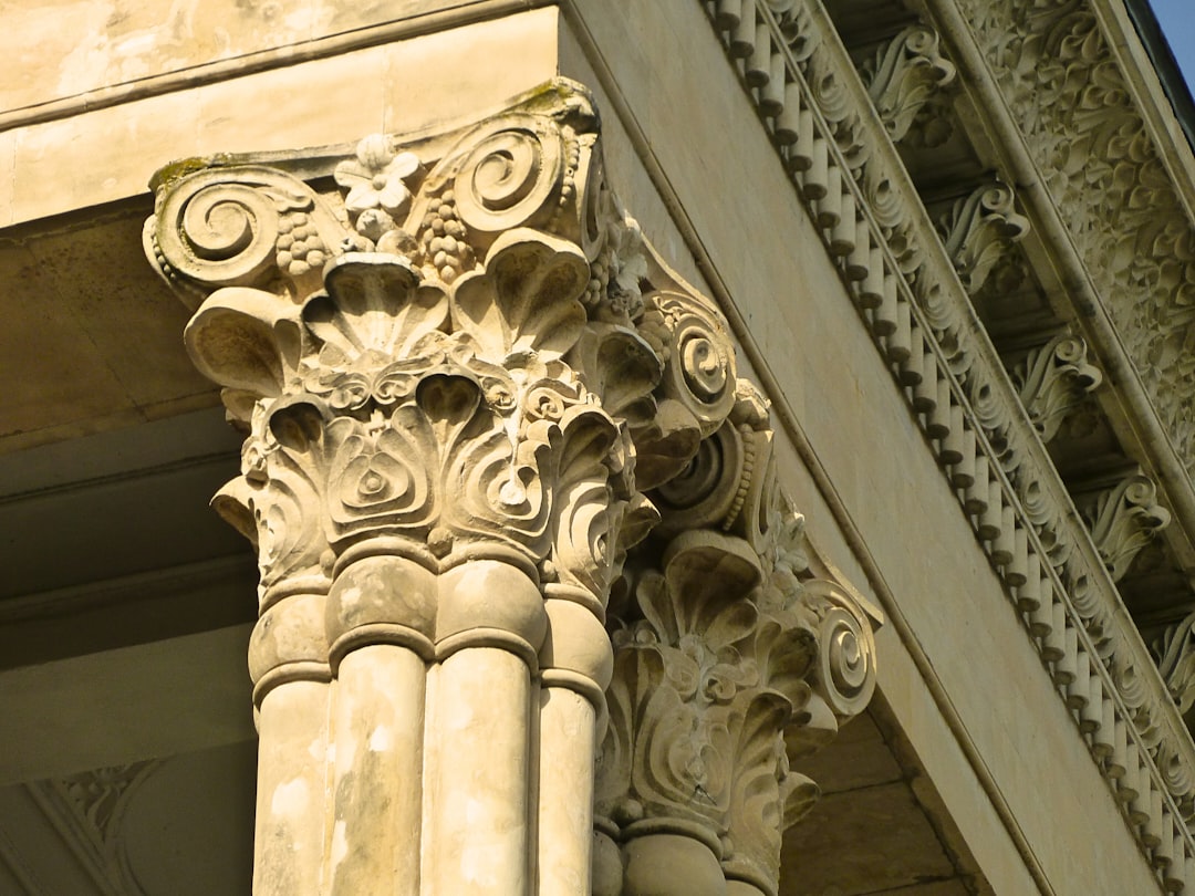 Intricate carvings adorn a classical-style column.
