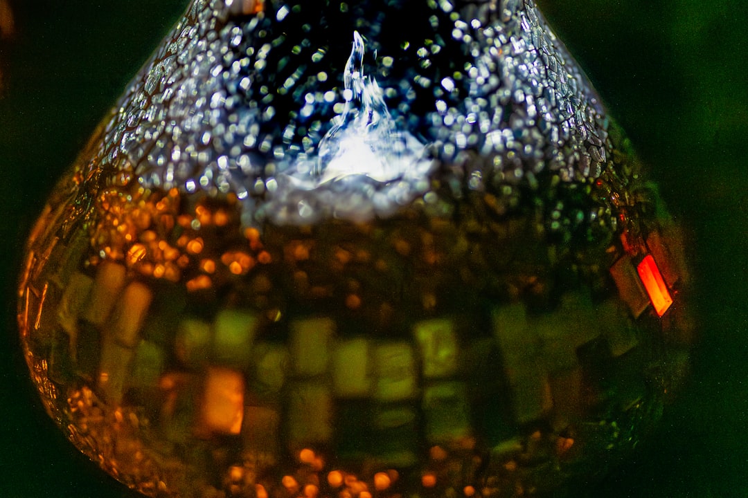 Close-up of a glass orb with mosaic pattern