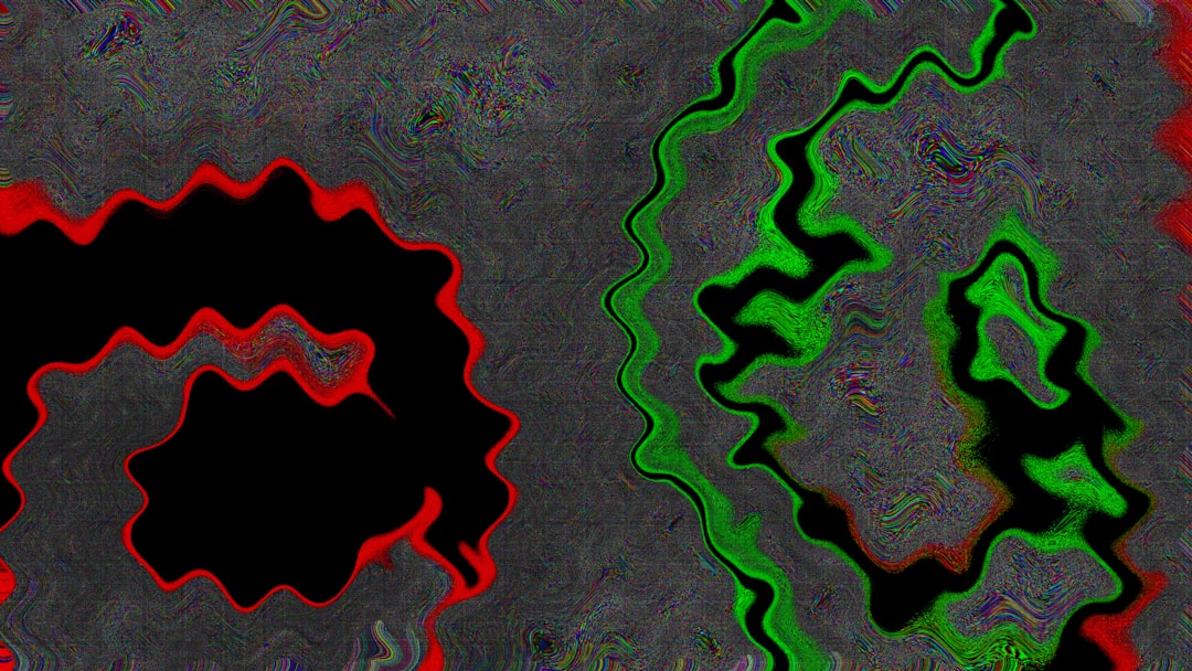 Abstract wavy red and green shapes on gray background