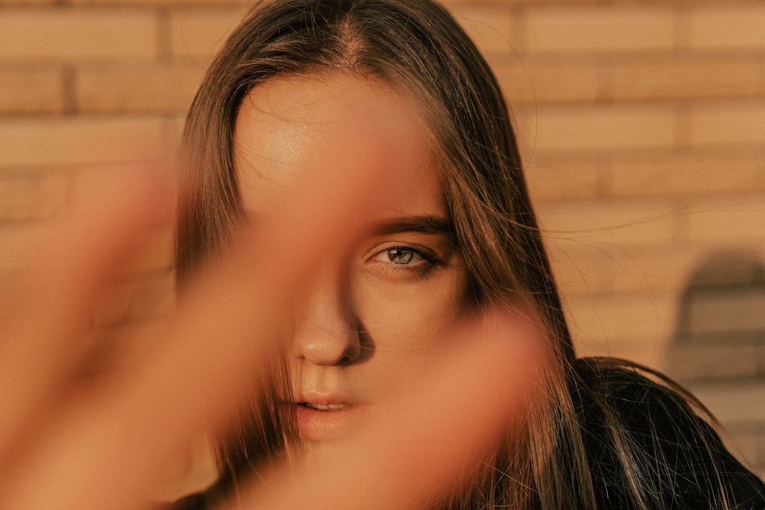 woman with brown hair smiling