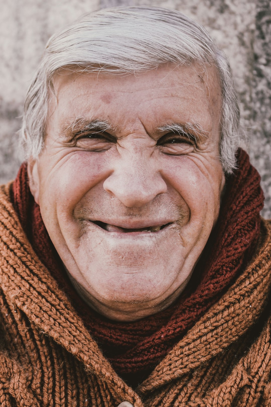 woman in red scarf smiling