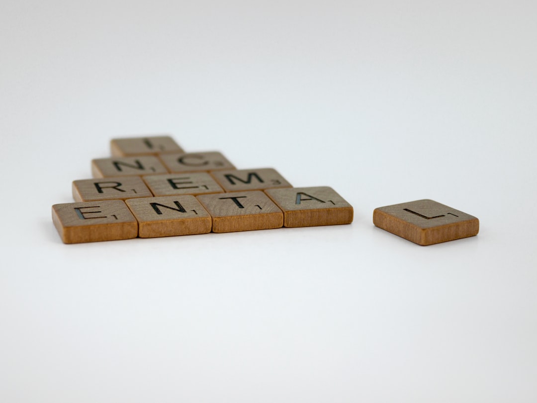 a scrabble type word on a white surface