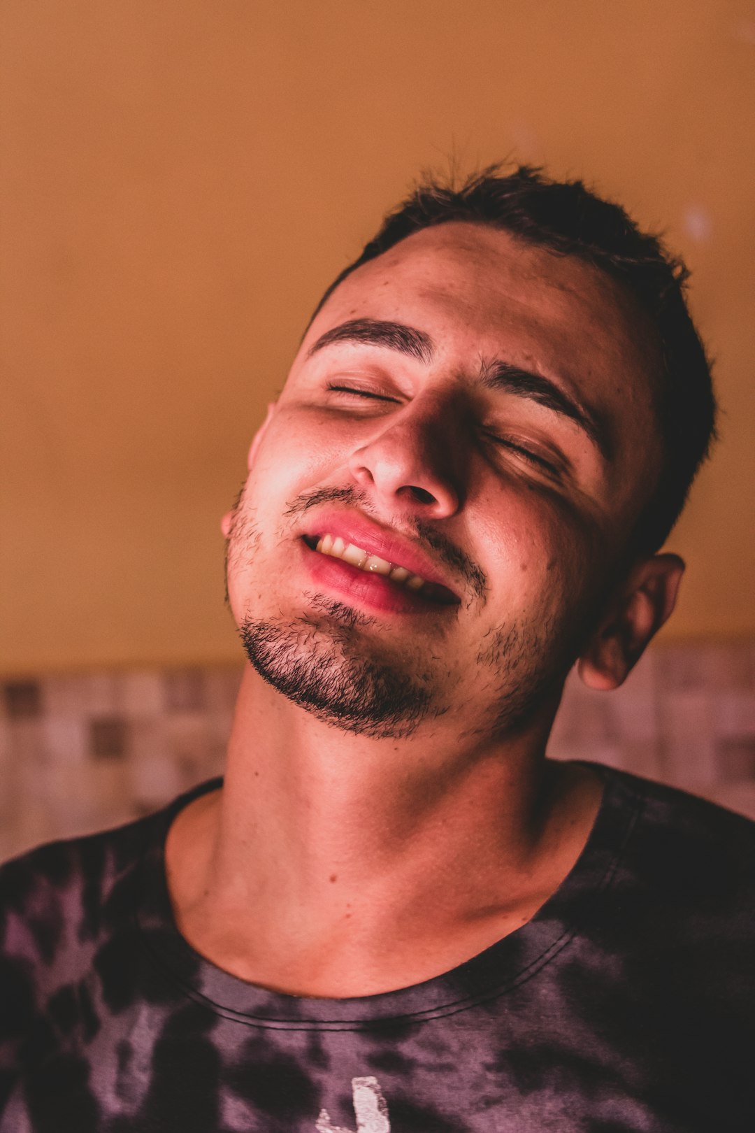 a man with his eyes closed and eyes closed