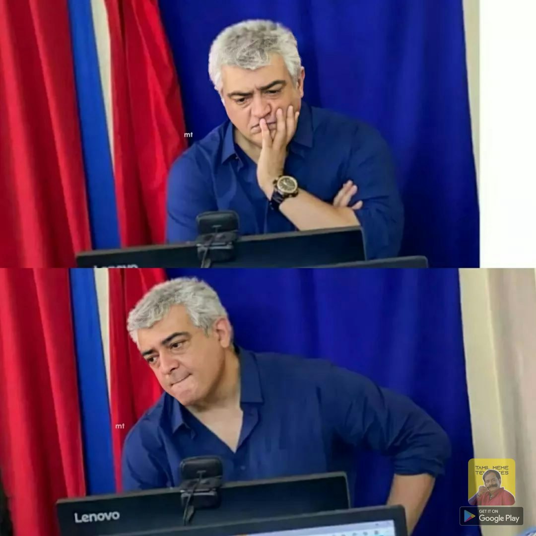 a man sitting in front of a laptop computer