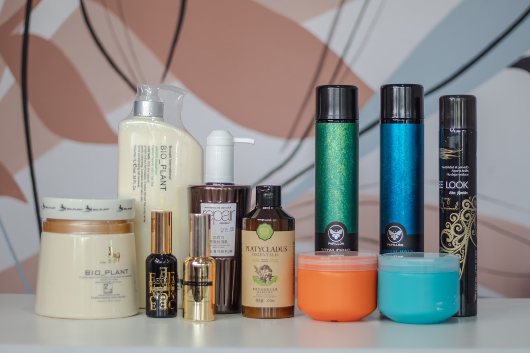 a table topped with lots of different types of hair products