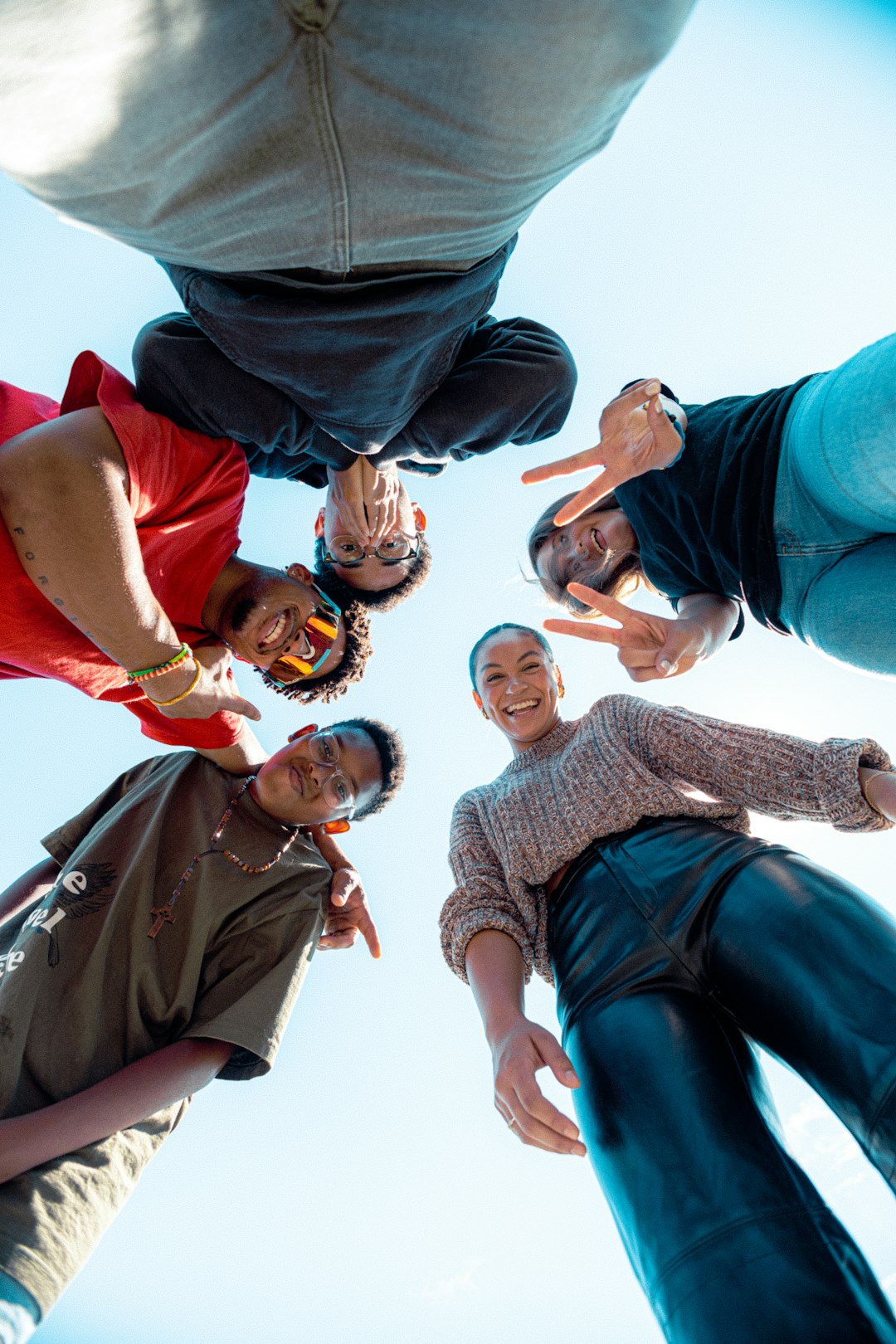a group of people standing in a circle