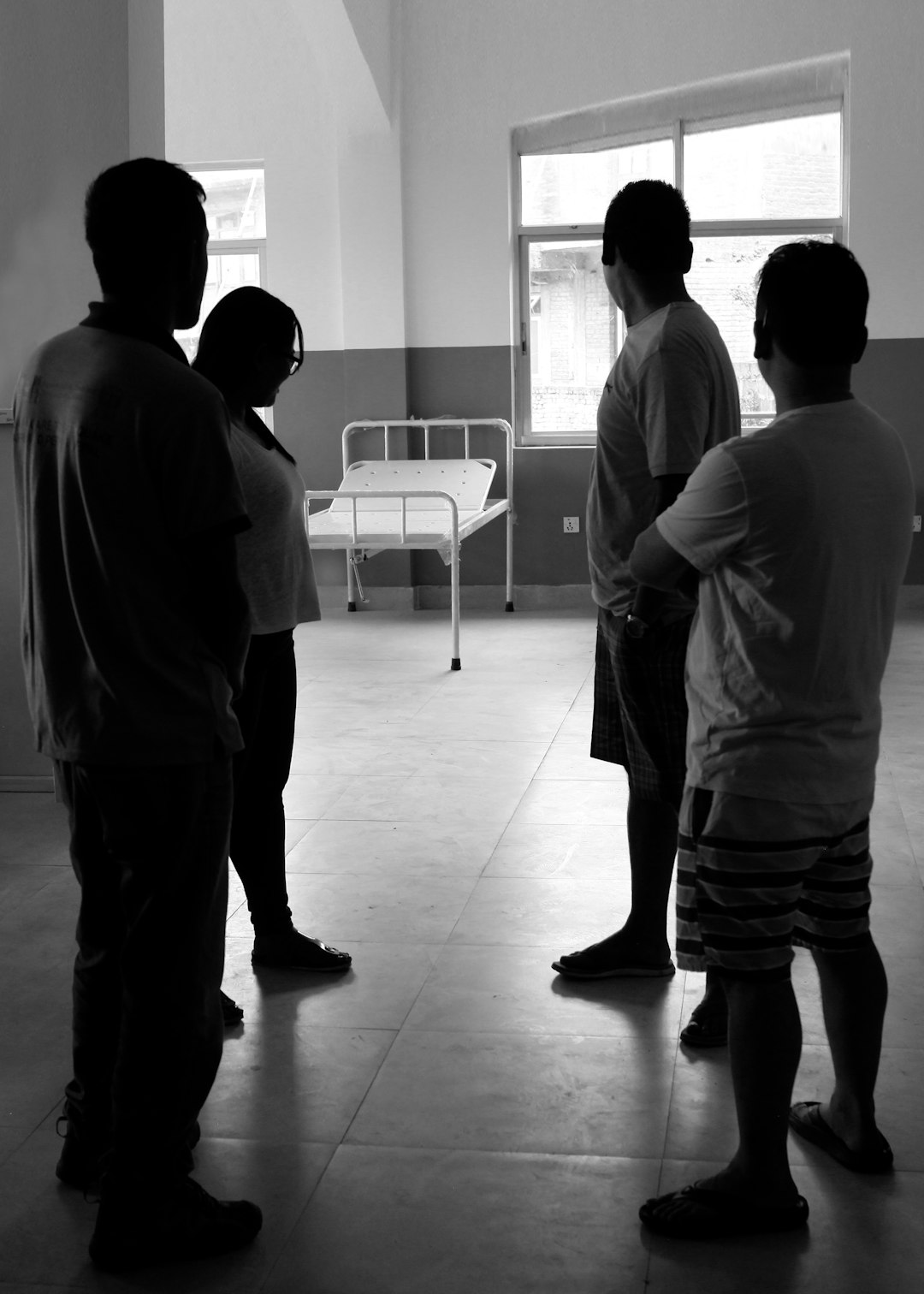 A group of people standing in a room