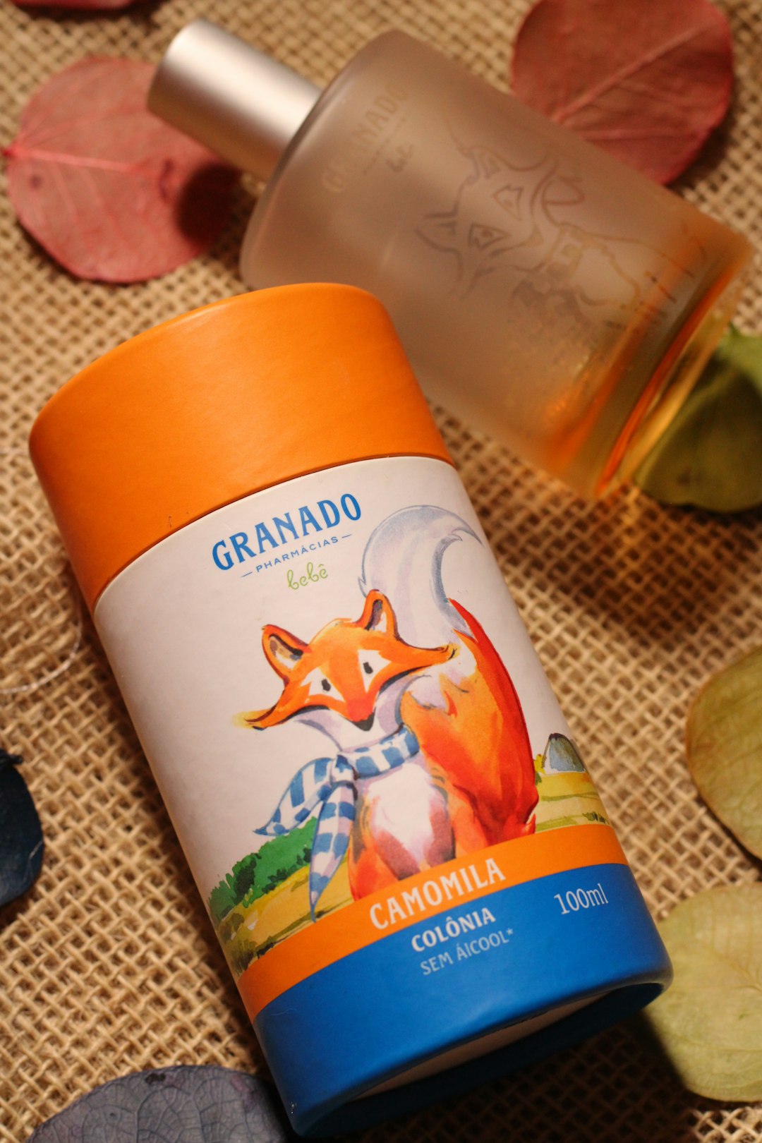 A close up of a bottle of liquid on a table