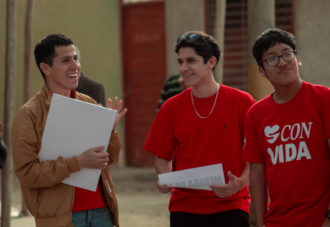 A group of people standing next to each other