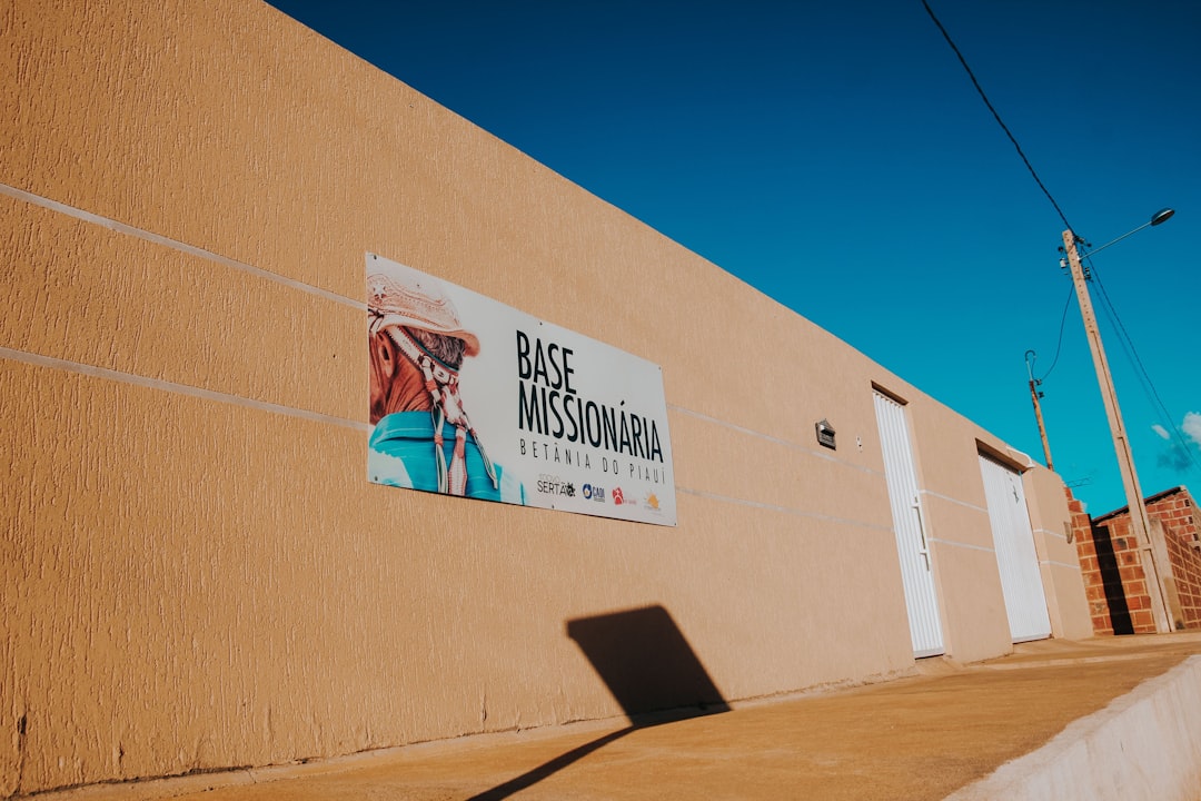 Missionary base sign on a textured wall